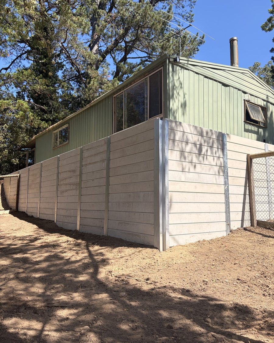 Edinburgh Road Lilydale, the completed engineered retaining wall below the structures it protects