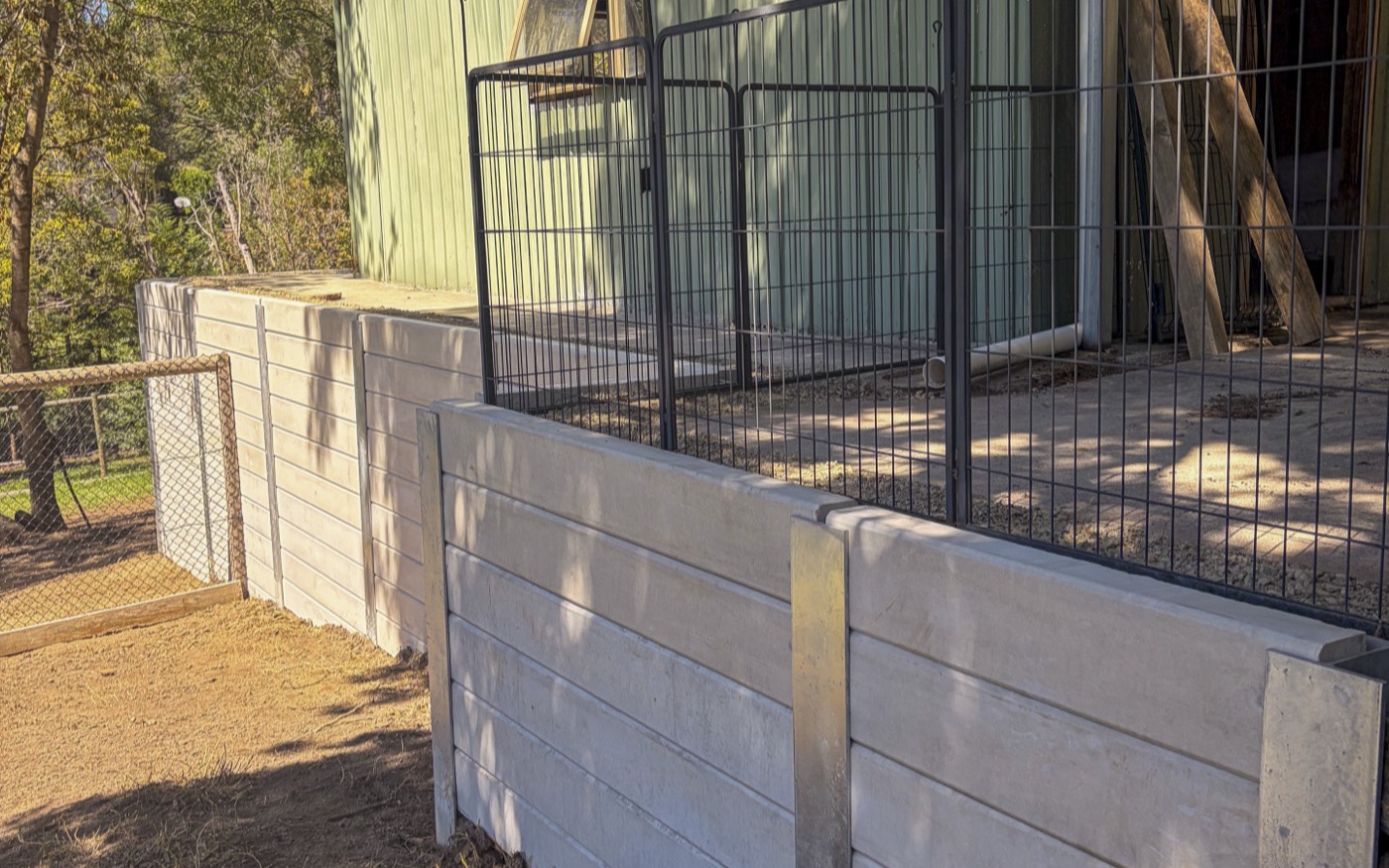 New concrete sleeper wall rebuilt on the original alignment