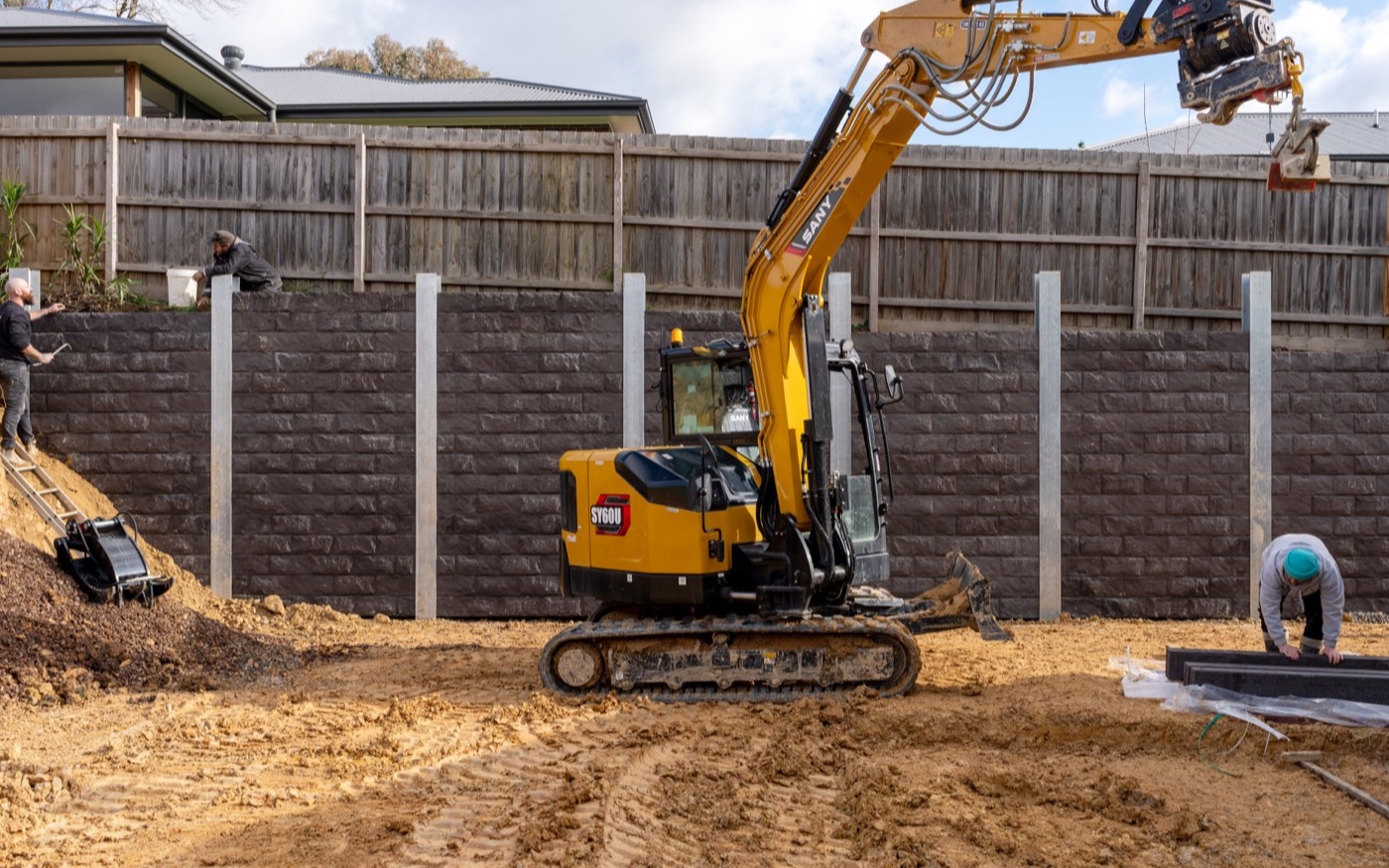 Steel posts set into hard ground and concreted